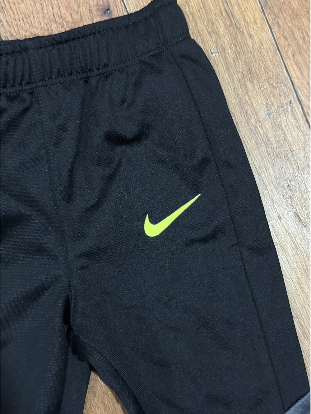 Nike Toddler Black Athletic Pants with Neon Green Logo, Size 12M